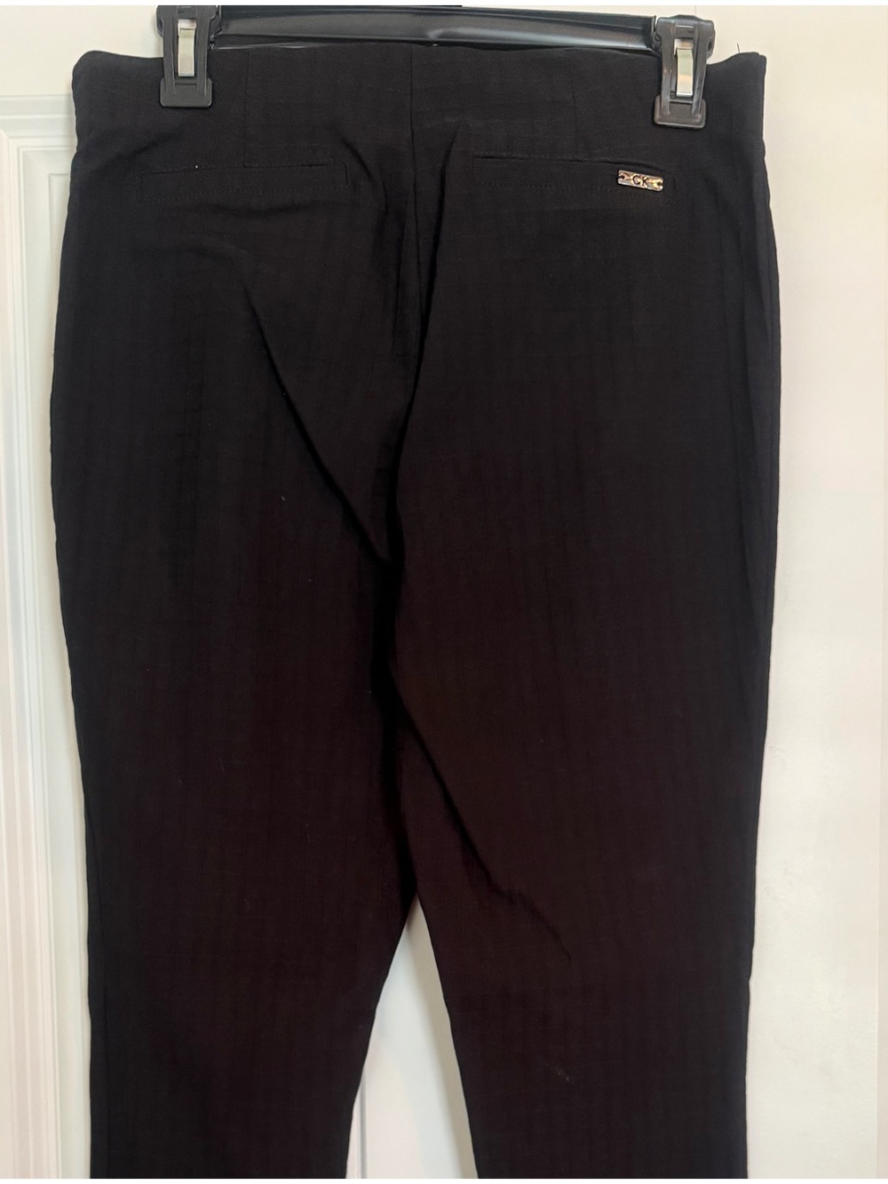 Women’s size 8 Calvin Klein, black pants.